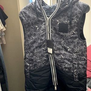 Brand new woman’s Armani exchange vest, with tags on it $ 2,690.00